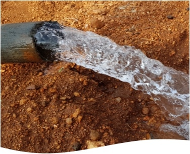 Water is pouring out of a pipe